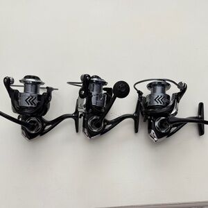 Three spinning reels for ice, fishing or summer